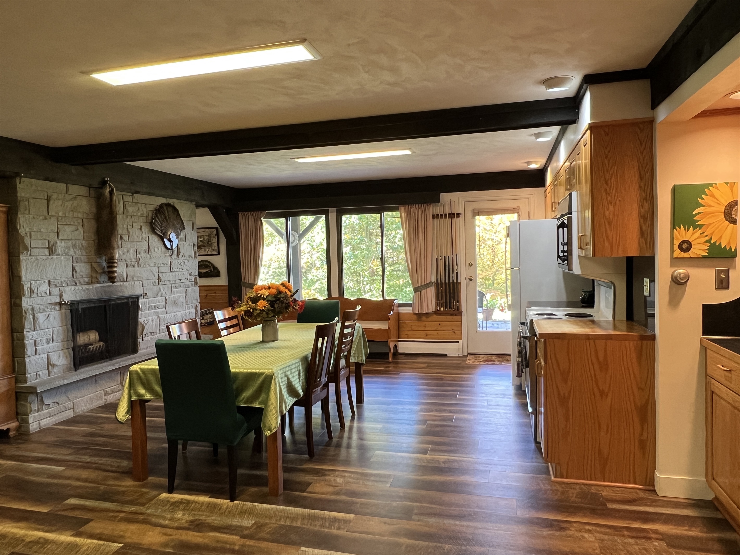 Kitchen and dining with decorative fireplace