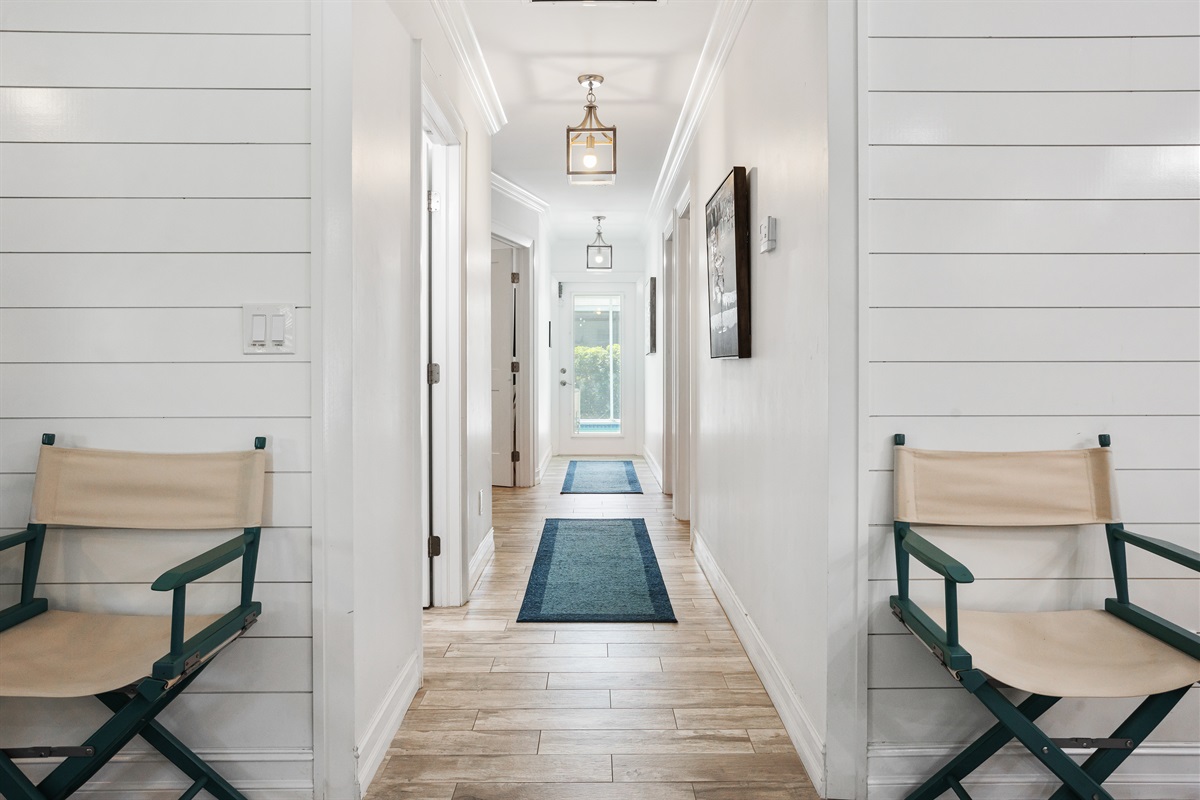 Hallway to pool and bedrooms