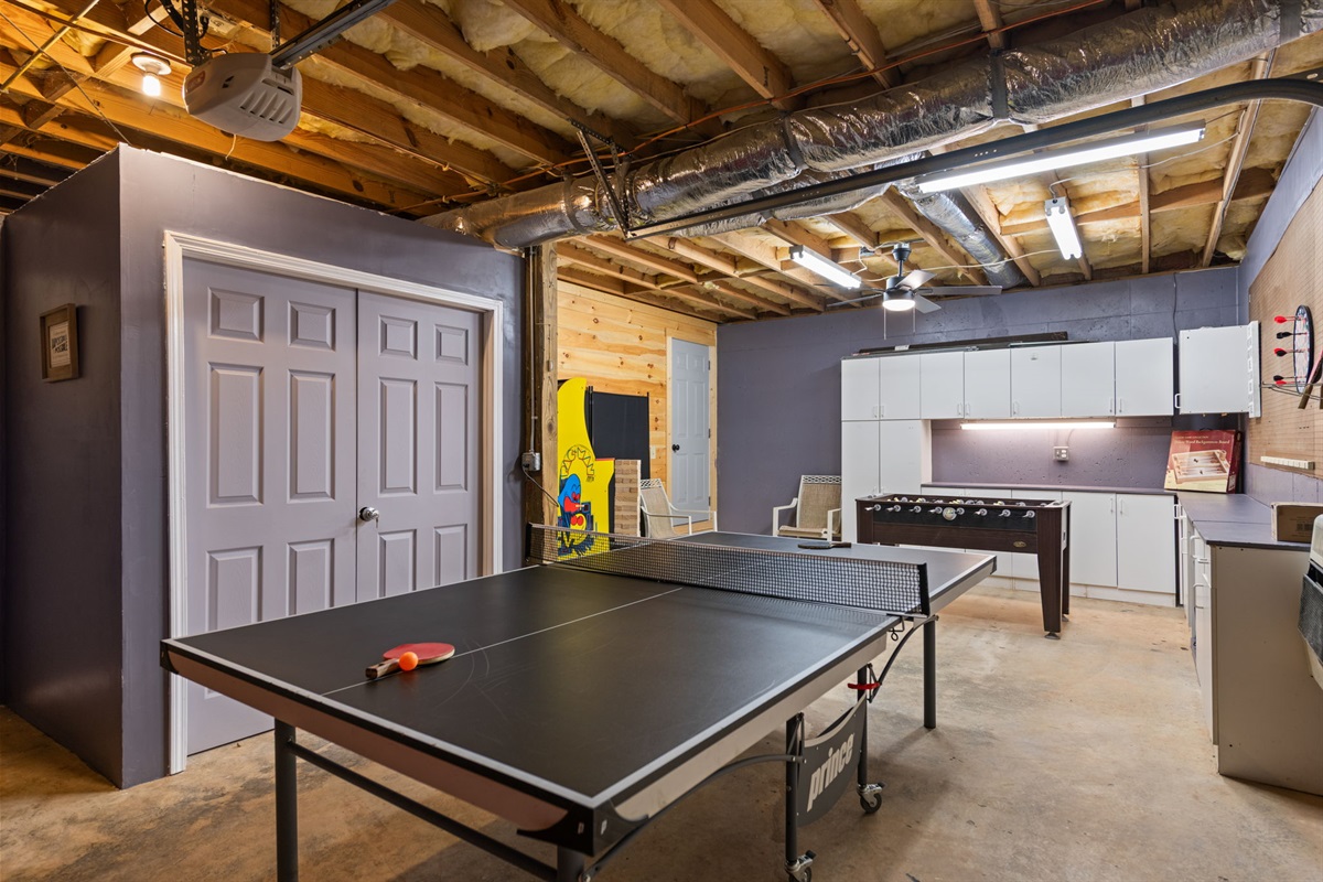 This alternate view of the game room highlights its spacious layout and inviting setup from a different angle.