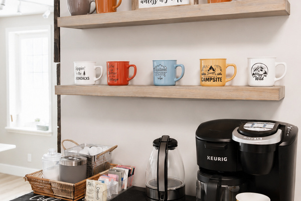 Start your mornings your way with a coffee corner stocked with K-cups, ground coffee, tea bags, and sugar.