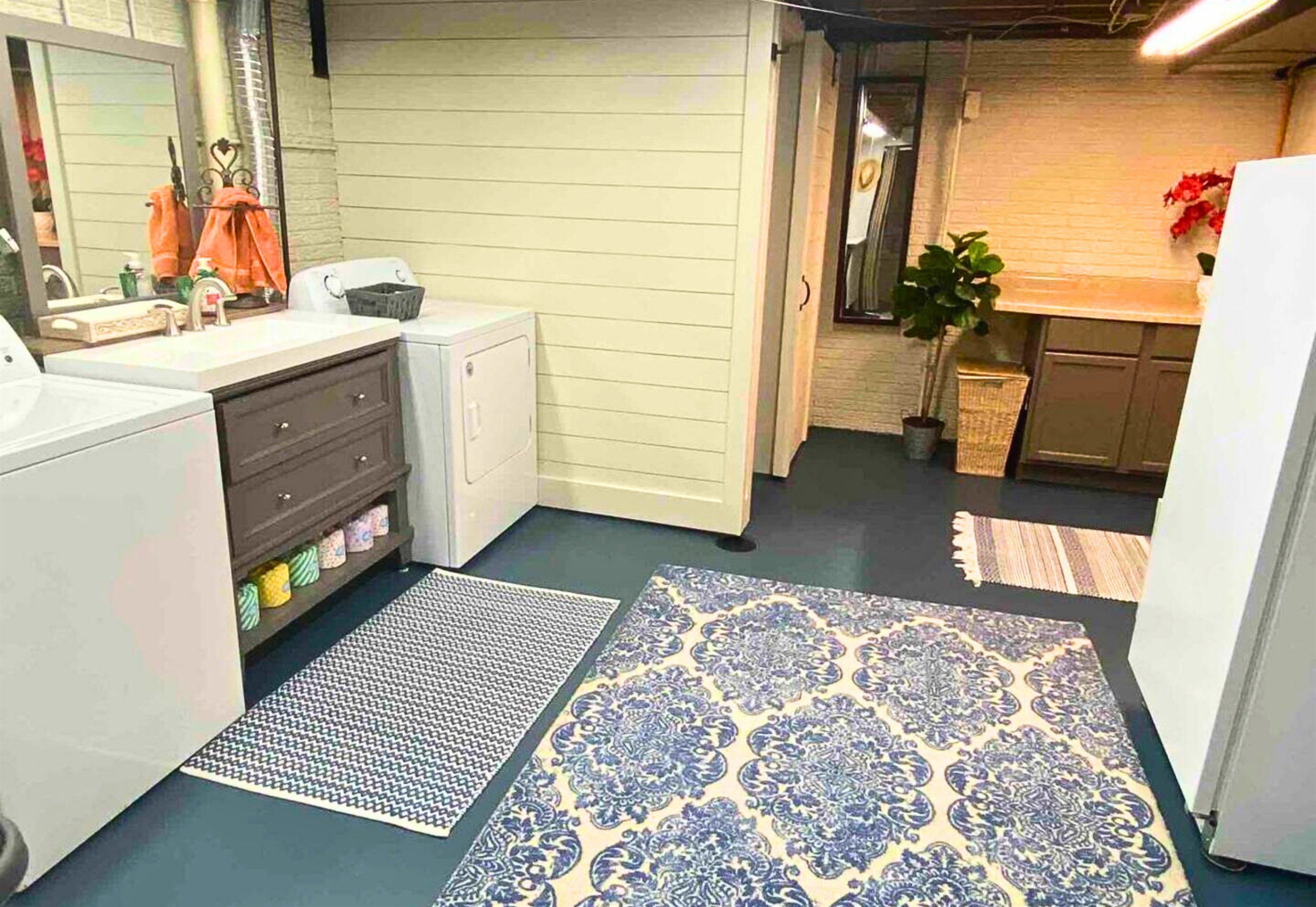 Laundry Access with Mirror and Sink on the Lower Level