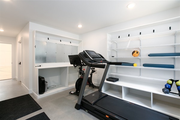 Workout Room with Peleton and Treadmill