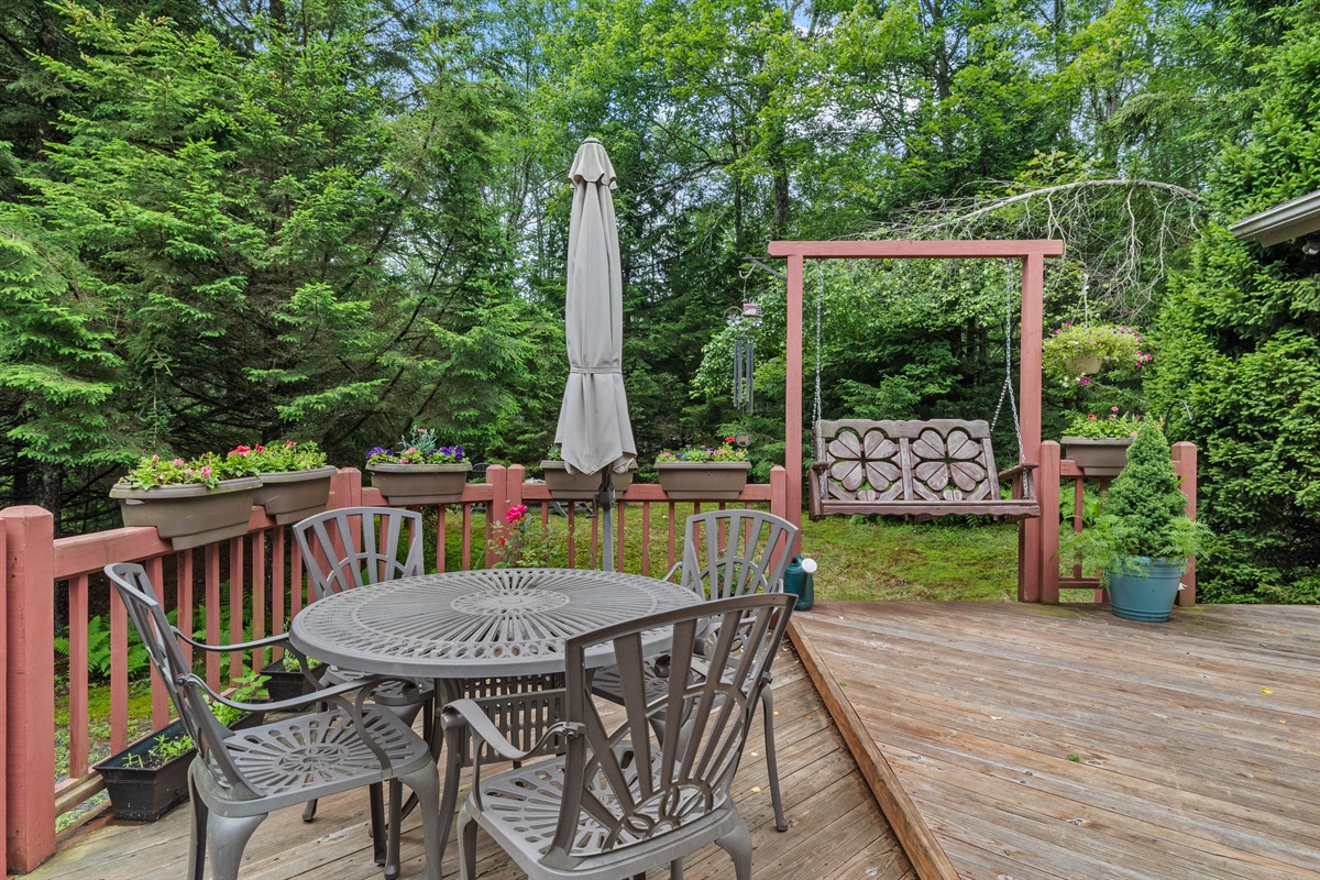 Spacious deck with grill and outdoor dining—perfect for cookouts and gatherings