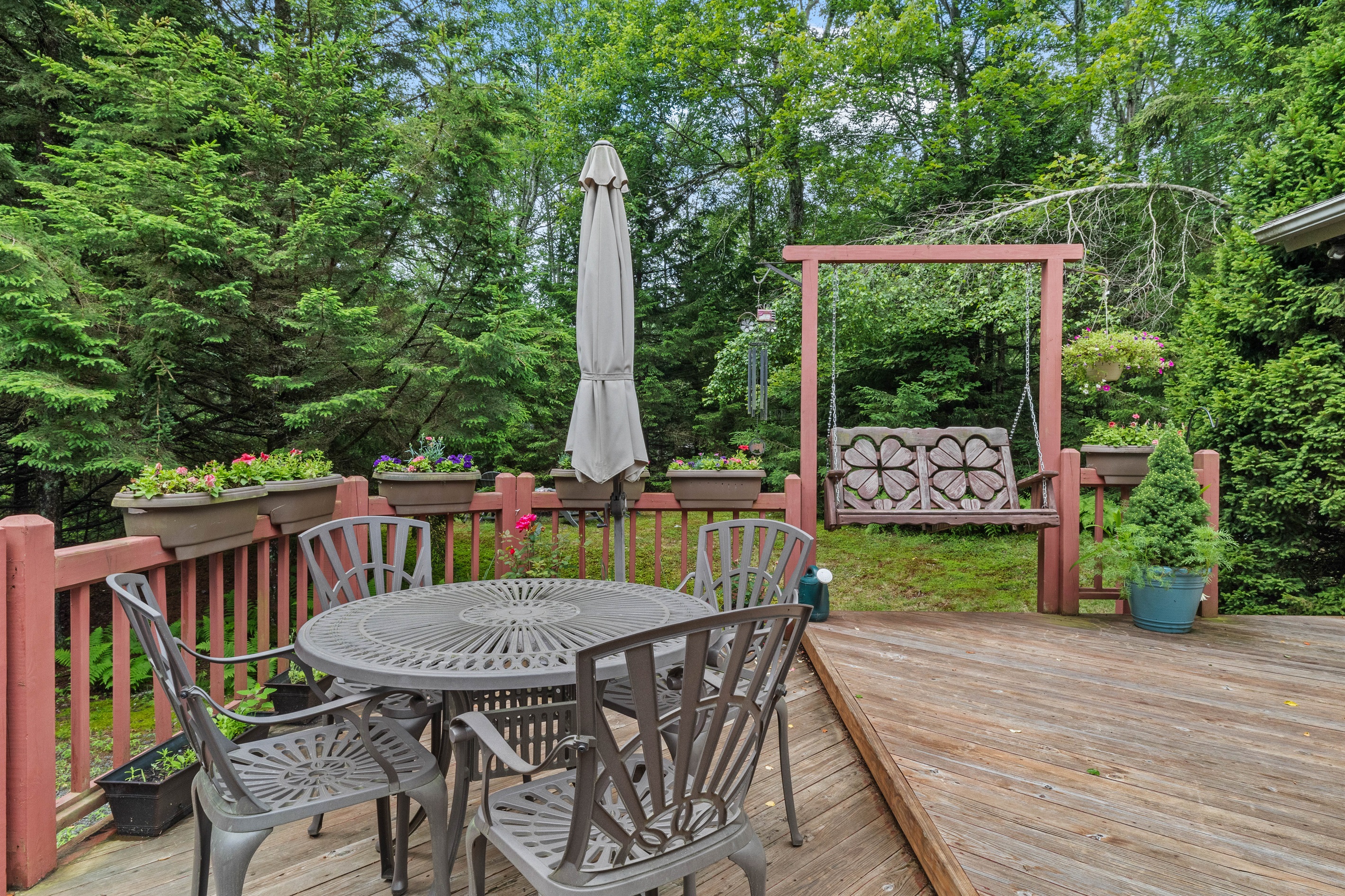 Spacious deck with grill and outdoor dining—perfect for cookouts and gatherings