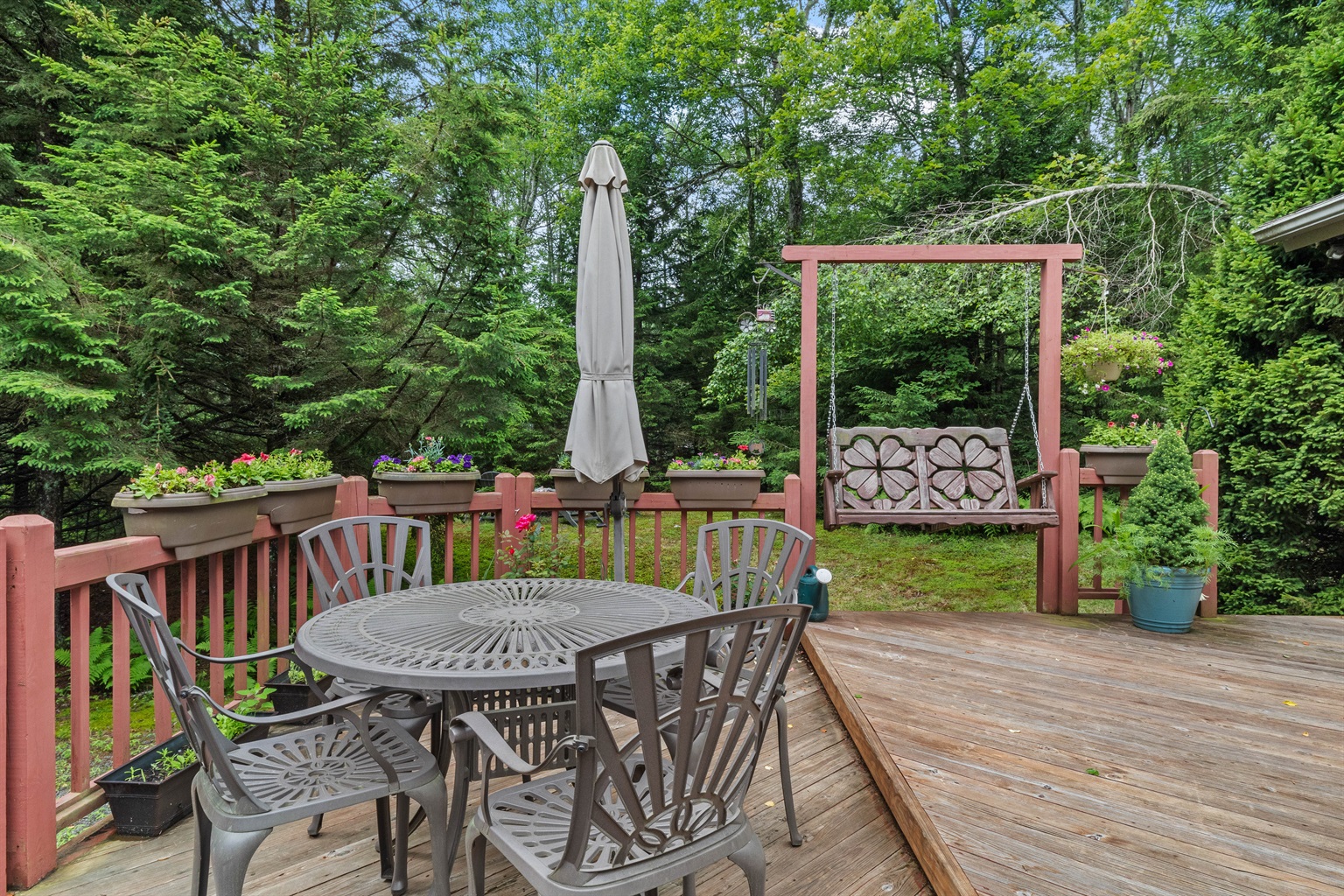 Spacious deck with grill and outdoor dining—perfect for cookouts and gatherings