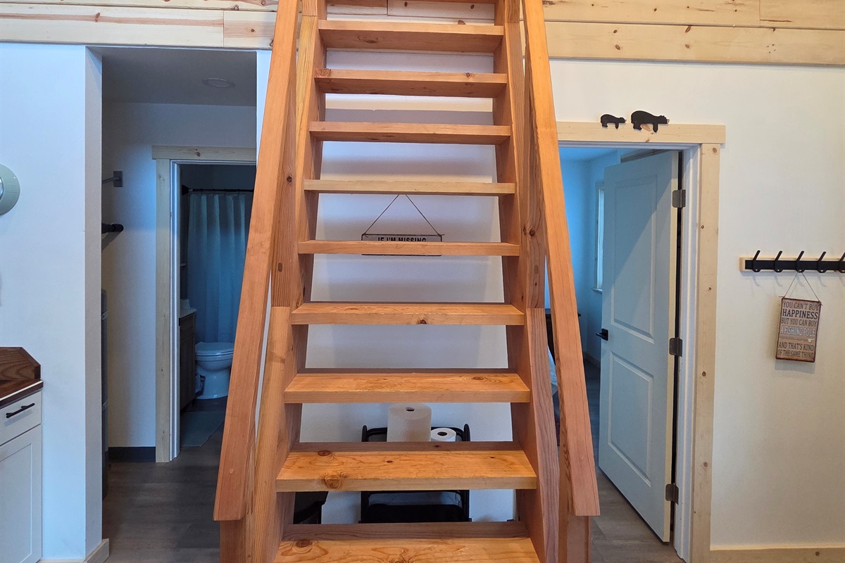 Ships ladder access to loft [Photo is representative but is not from this cabin].