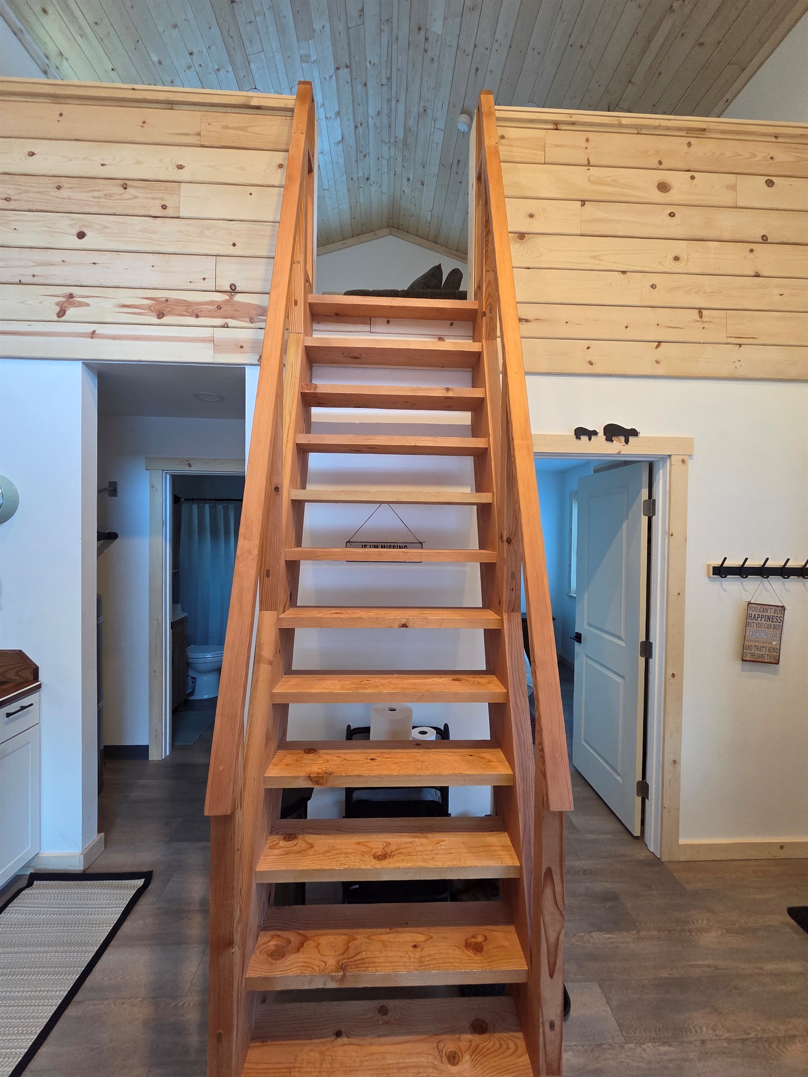 Ships ladder access to loft [Photo is representative but is not from this cabin].