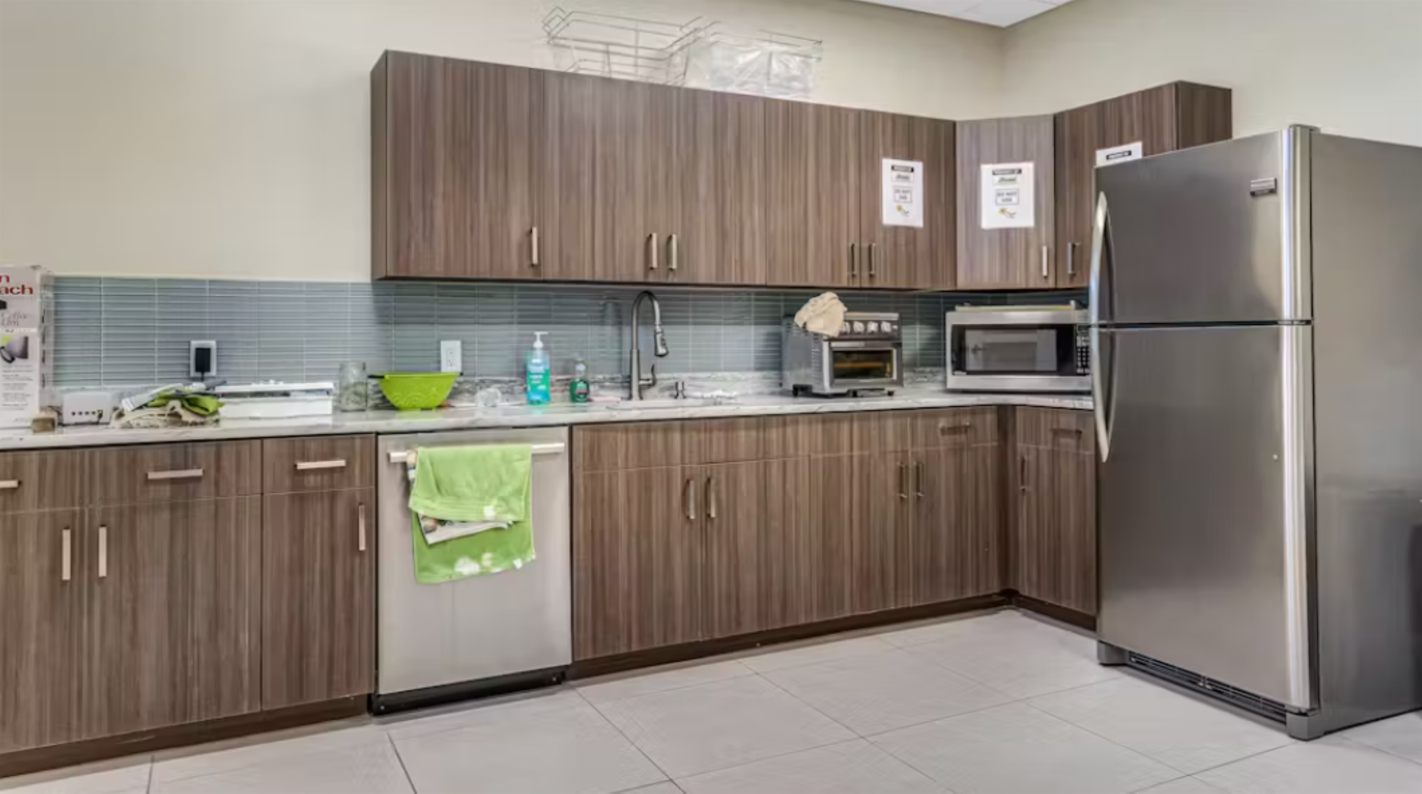 Well-Appointed Kitchenette: Whip up morning coffee or light snacks in our modern kitchenette, complete with full-size appliances and generous counter space for effortless entertaining.
