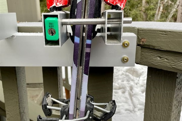Commercial grade lockable SKI & Snowboard Racks right outside your front door on the private deck.  
These are the same SKI-KEY racks Vail uses on Whistler & Blackcomb. Narrow rack is for skis & wider rack is for snowboards or extra wide skis.  