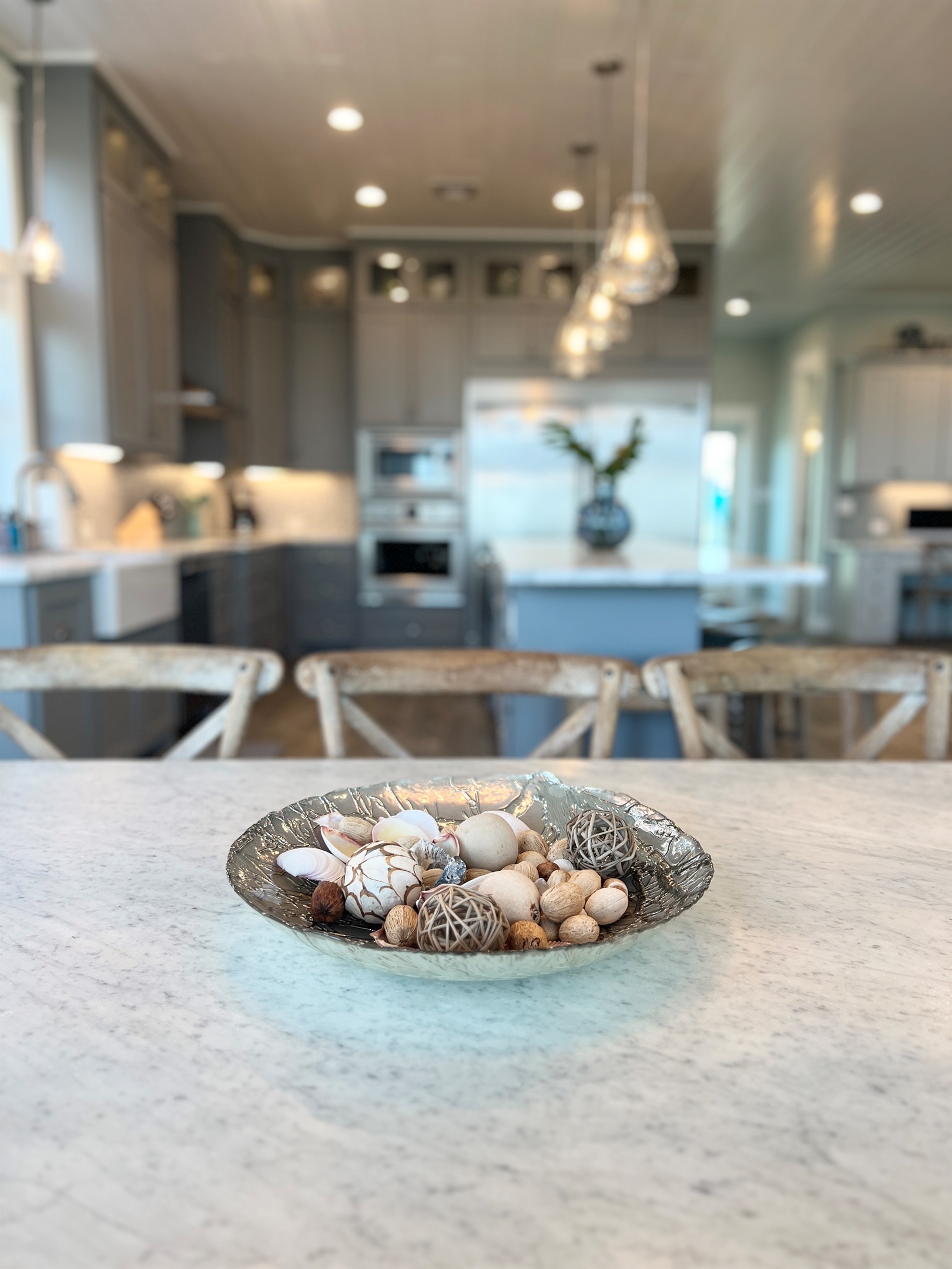 Crystal Paradise Kitchen: Bright, open kitchen featuring luxurious marble surfaces and generous space for gatherings.