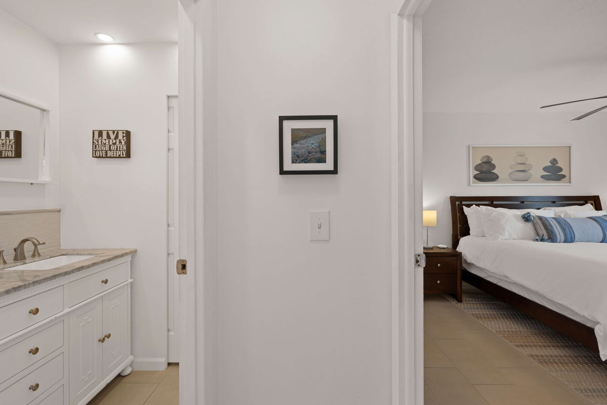 Just off the living room is the primary bedroom and the bathroom.