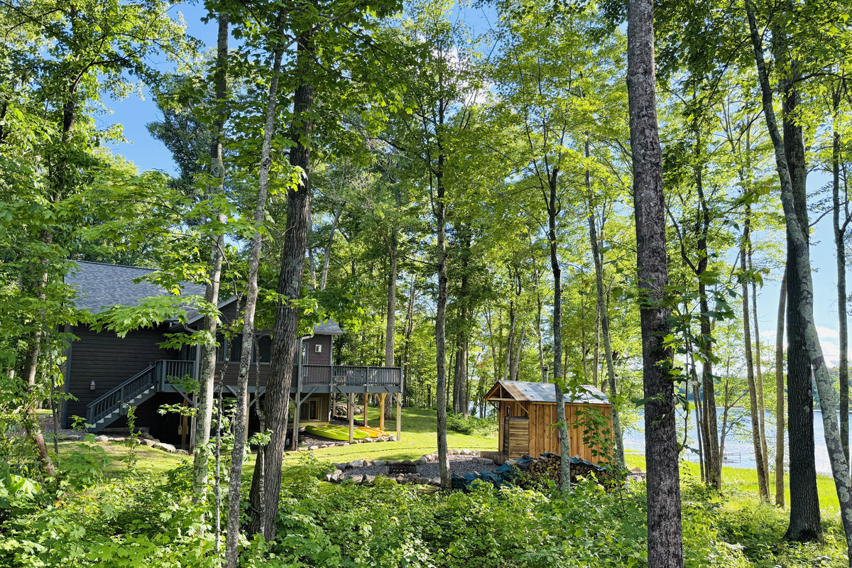 Our authentic wood burning sauna with a great view of the lake.