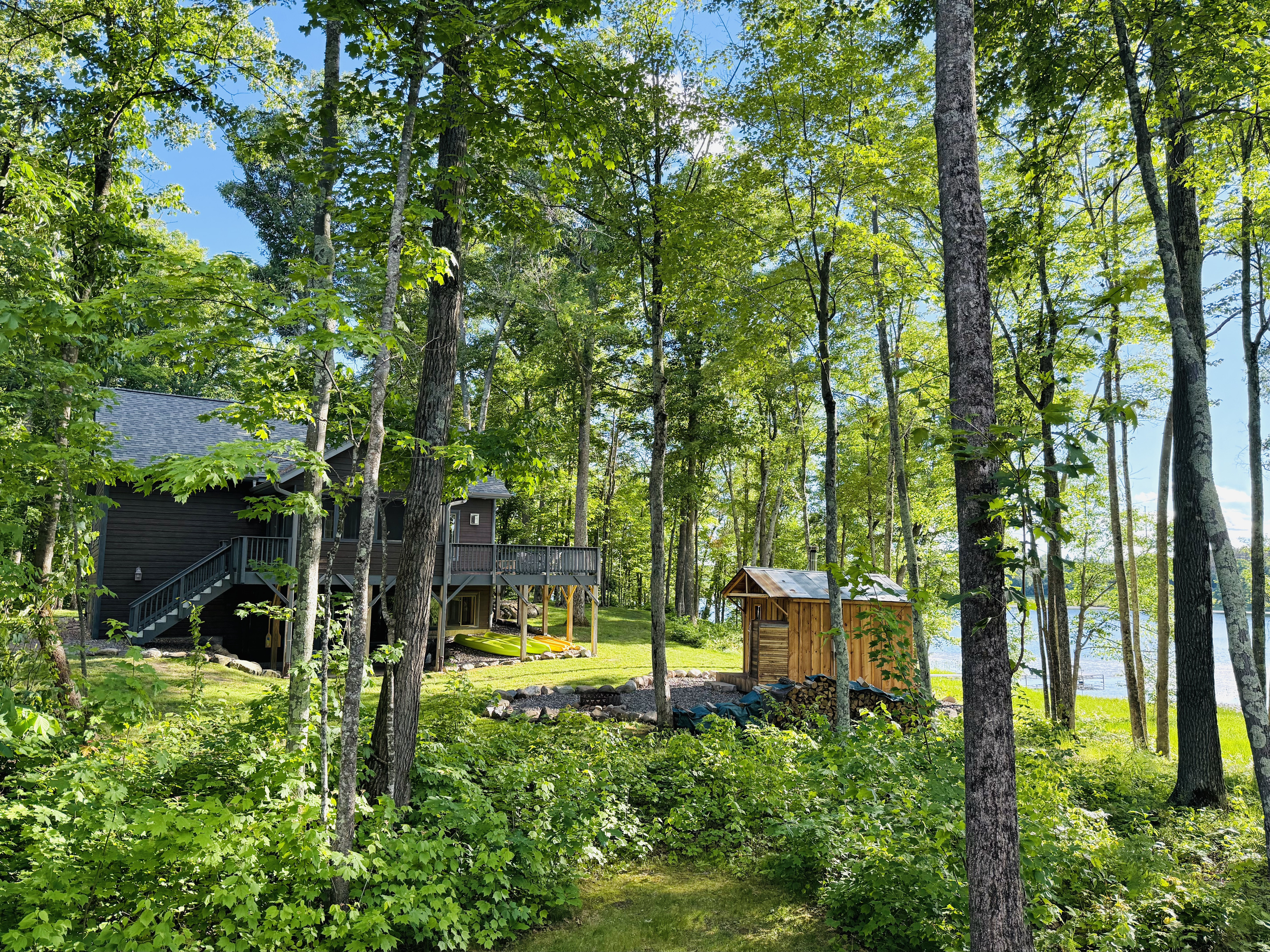 Our authentic wood burning sauna with a great view of the lake.