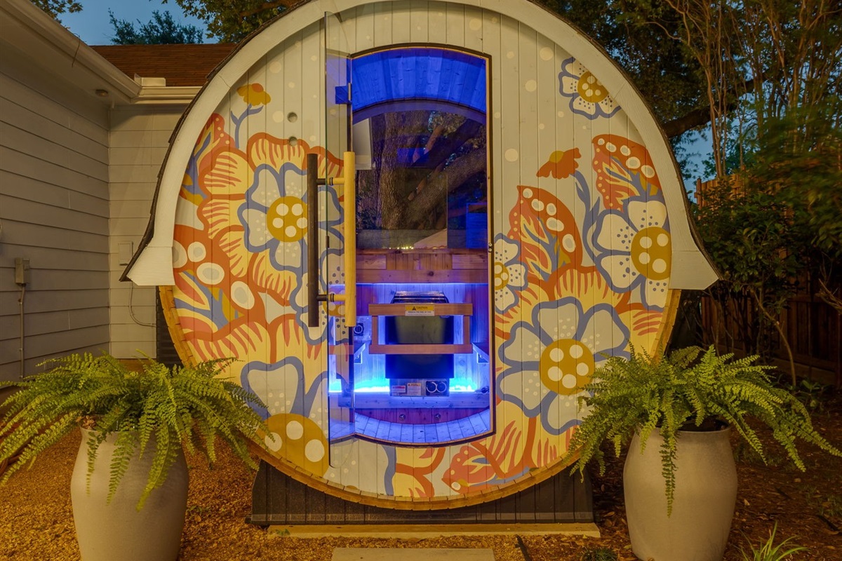 A custom mural barrel sauna in your own backyard. Hand-painted, private and glowing at twilight. There is no other Fort Worth vacation rental that looks like this.
