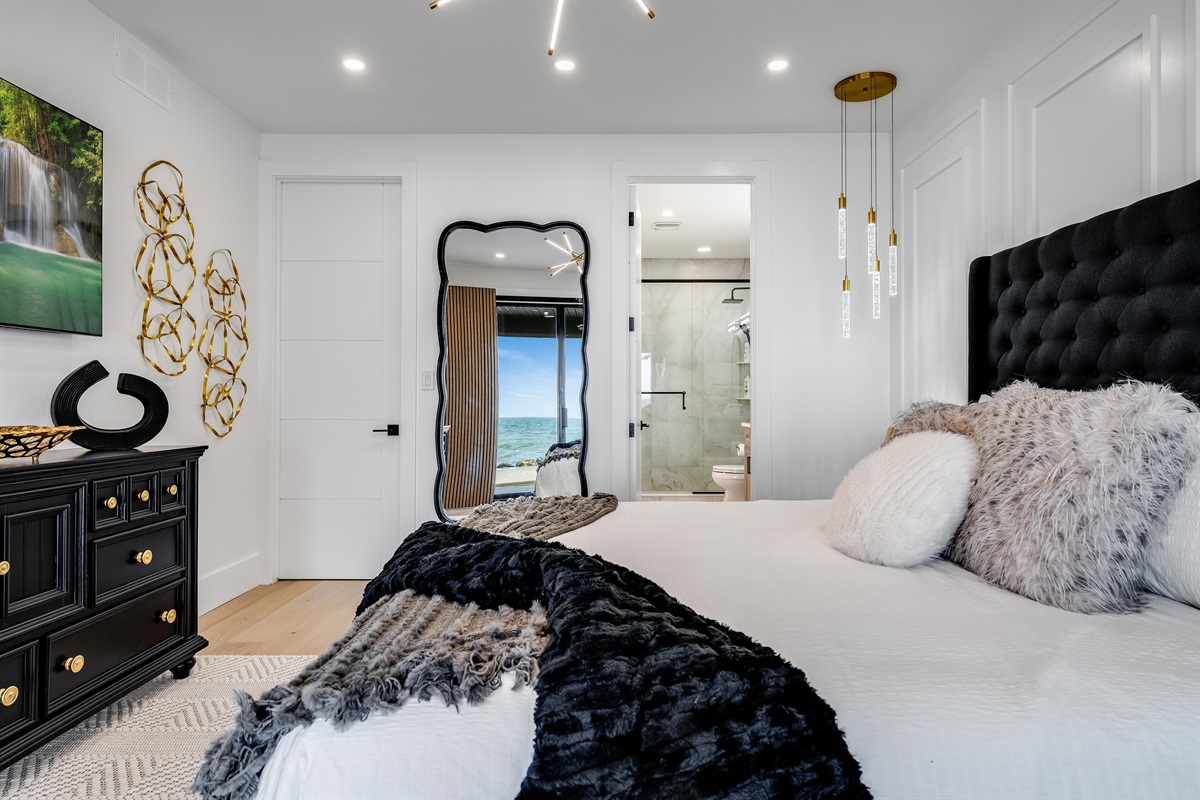 King Bedroom with Premier Master Suite with private 4 piece bath and smart tv.