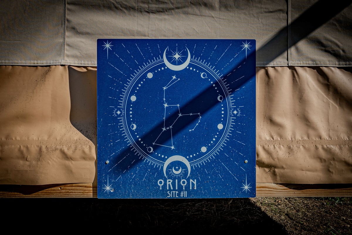 When you see this sign on the back of the tent, you'll know you've arrived.