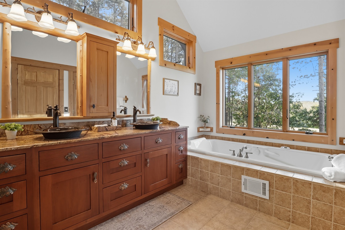 Bathroom 1 Full master bath with jet tub and walk in shower main floor