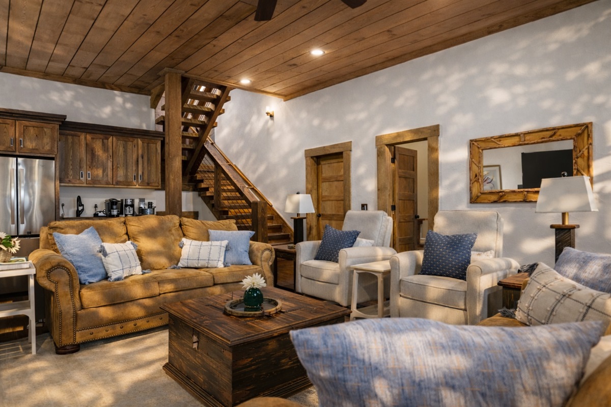 Step into a whole new atmosphere in the downstairs living room, designed for family fun and relaxation.