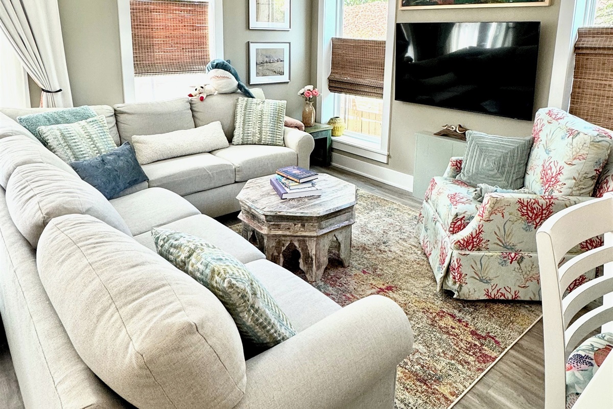 Mounted TVs in living space and all 3 bedrooms