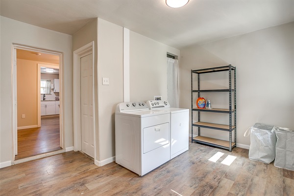 Laundry room with full-size washer and dryer for your longer stays