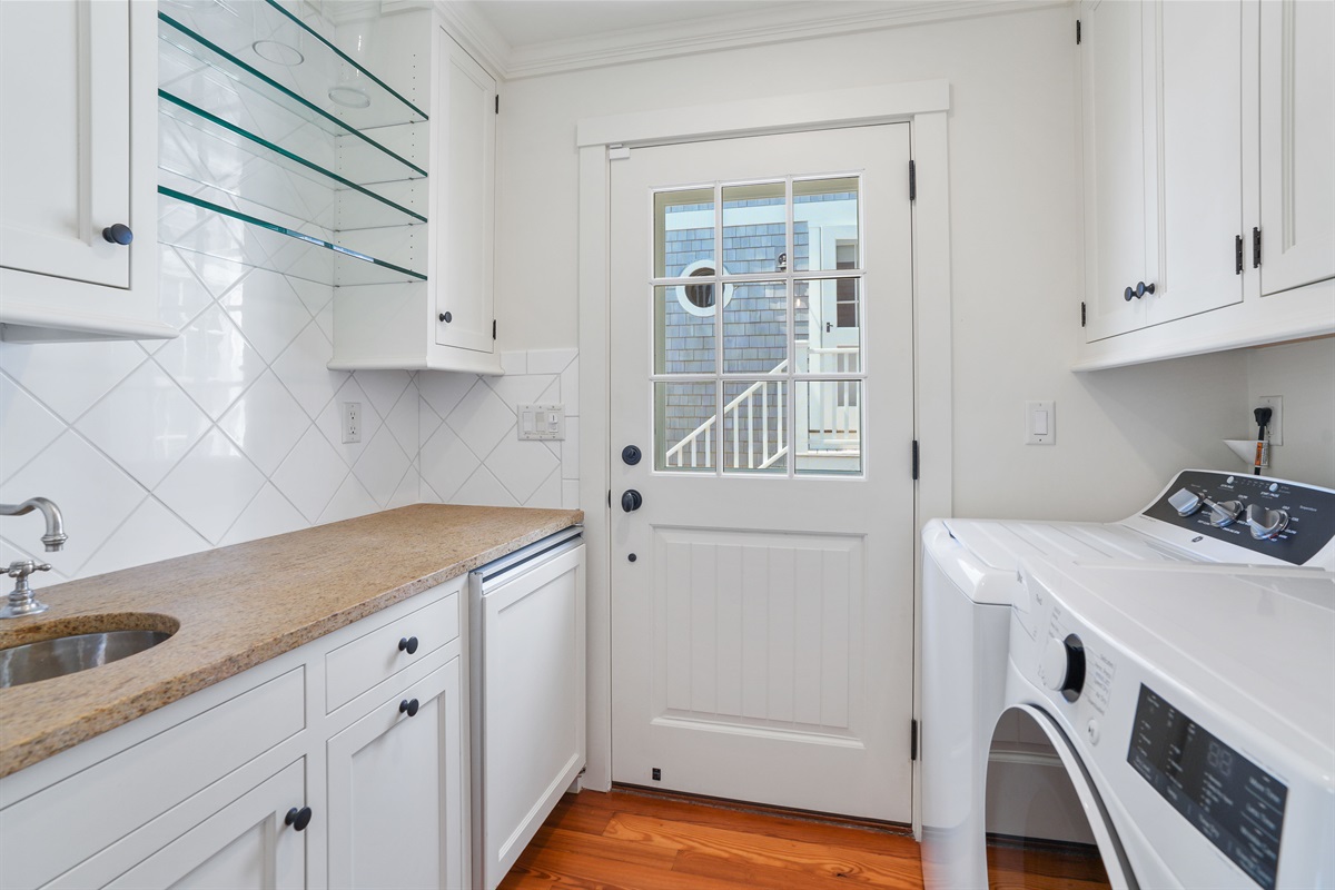 Laundry Room Leads to Patio Area