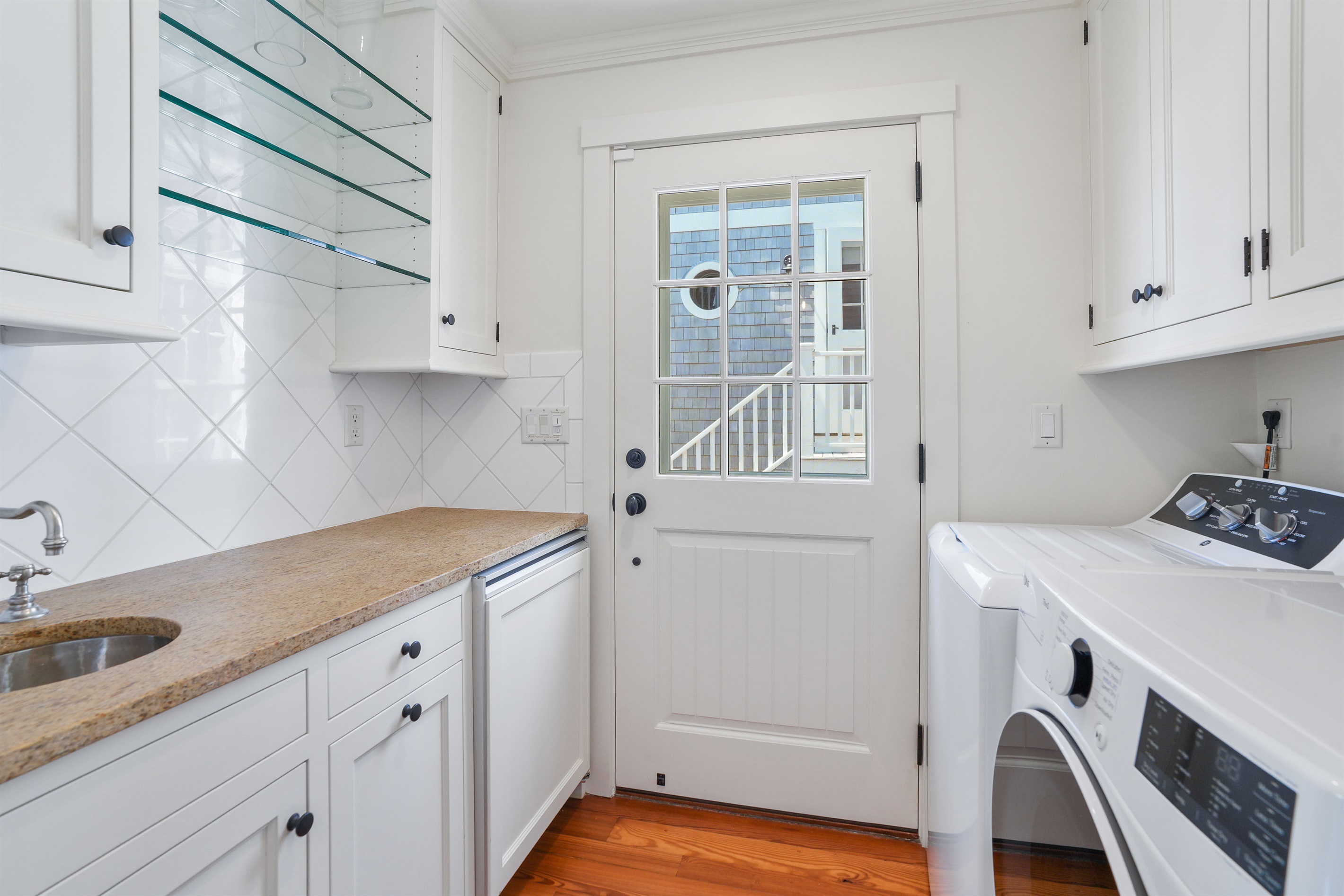 Laundry Room Leads to Patio Area