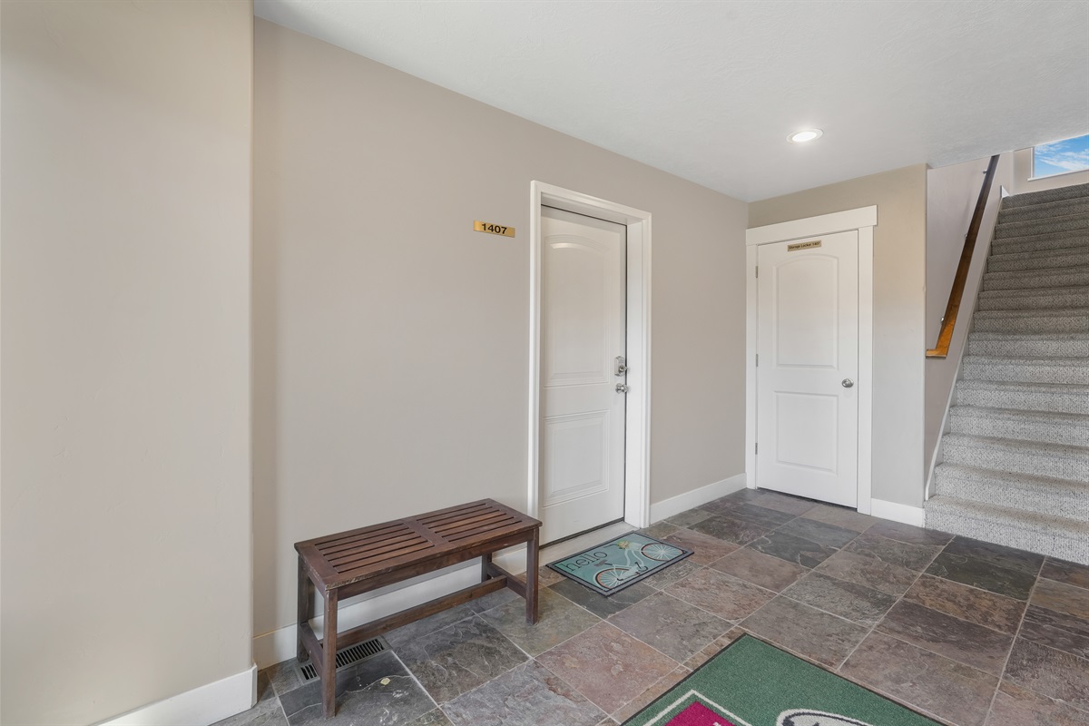 A clean and welcoming entryway that makes coming home feel easy and comfortable.