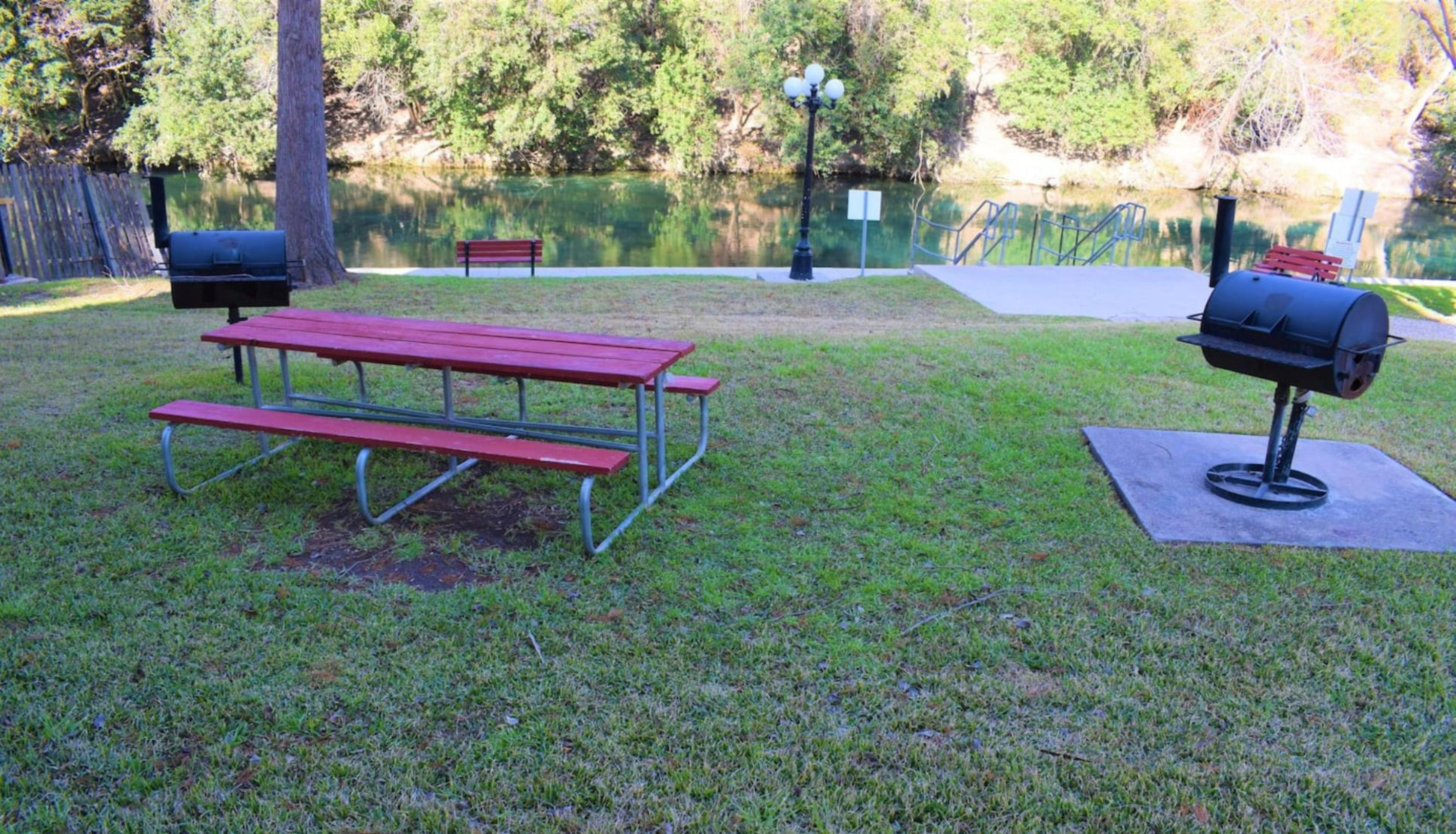 Picnic tables and BBQ pits.