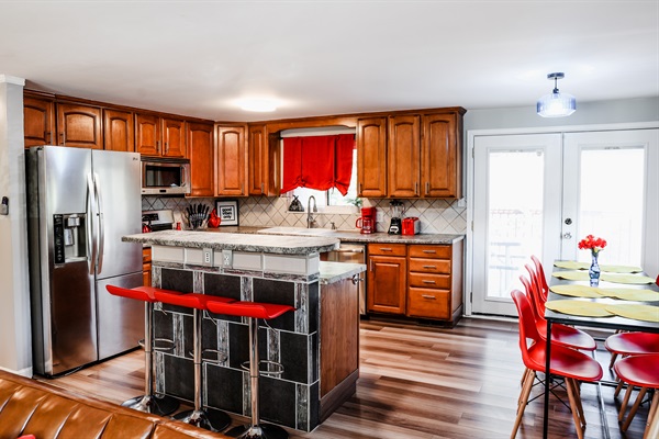 Feast and Fun for All – Create memorable meals in our kitchen, stocked with utensils and kitchenware. Share laughter and great food at the 8-seater dining table