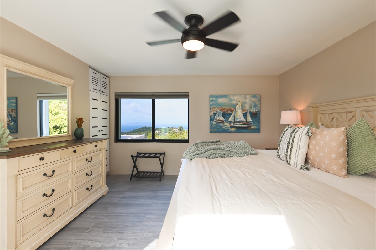 Elegant bedroom retreat with island-inspired d&eacute;cor and serene ambiance.