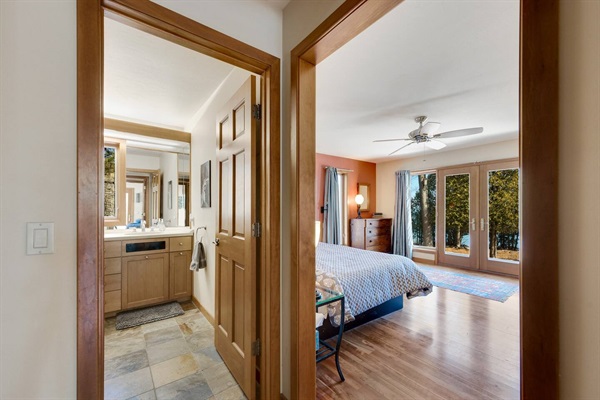 Master bedroom has an ensuite bathroom.  A door provides privacy to this section of the first floor.