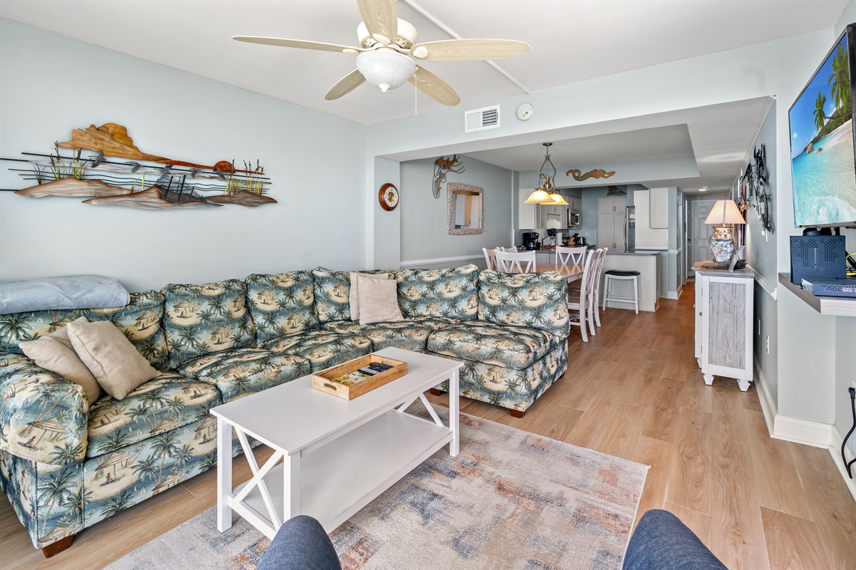Spacious Living Room with oceanfront views and balcony
