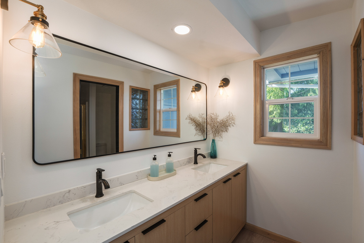 This bathroom is shared with both Bedroom 3 and Bedroom 4. Double sink with stand up shower. 