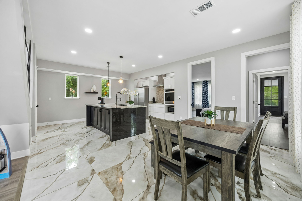 Sleek modern kitchen designed for gathering and entertaining