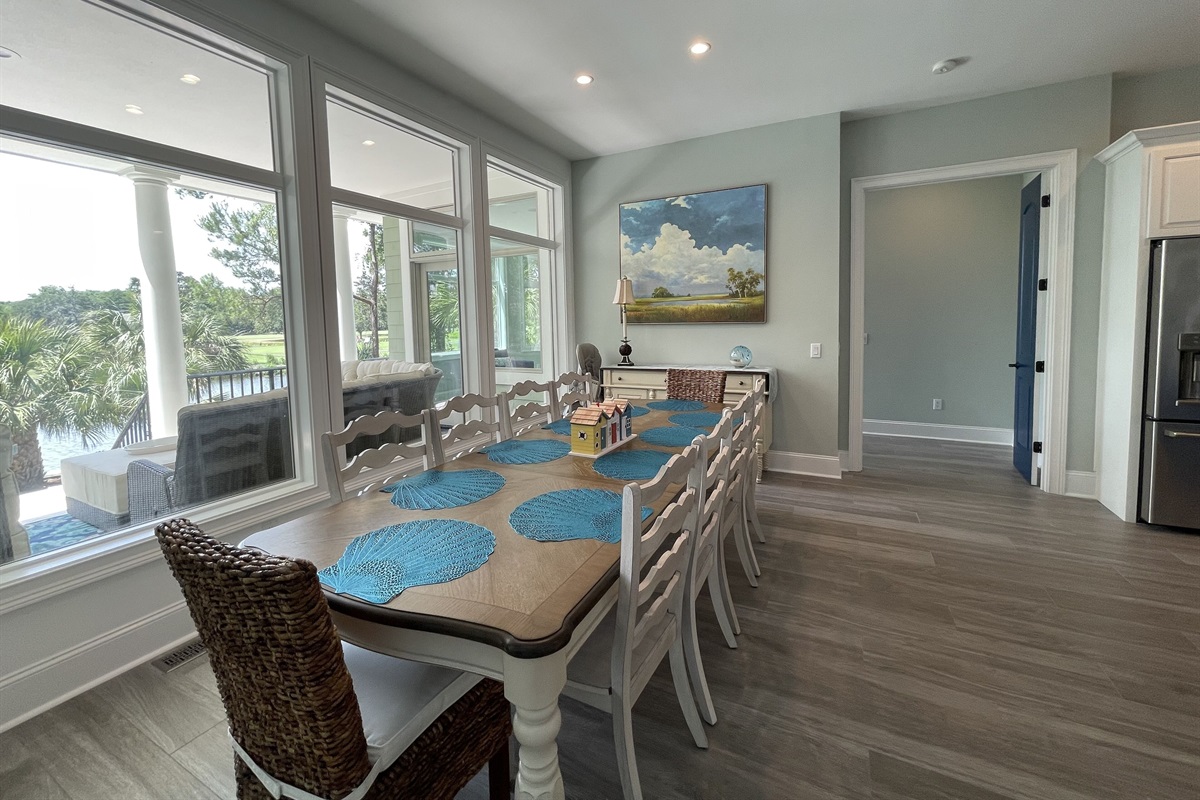 Dining area with seating for 10 has views of the 11 mile lagoon and golf course