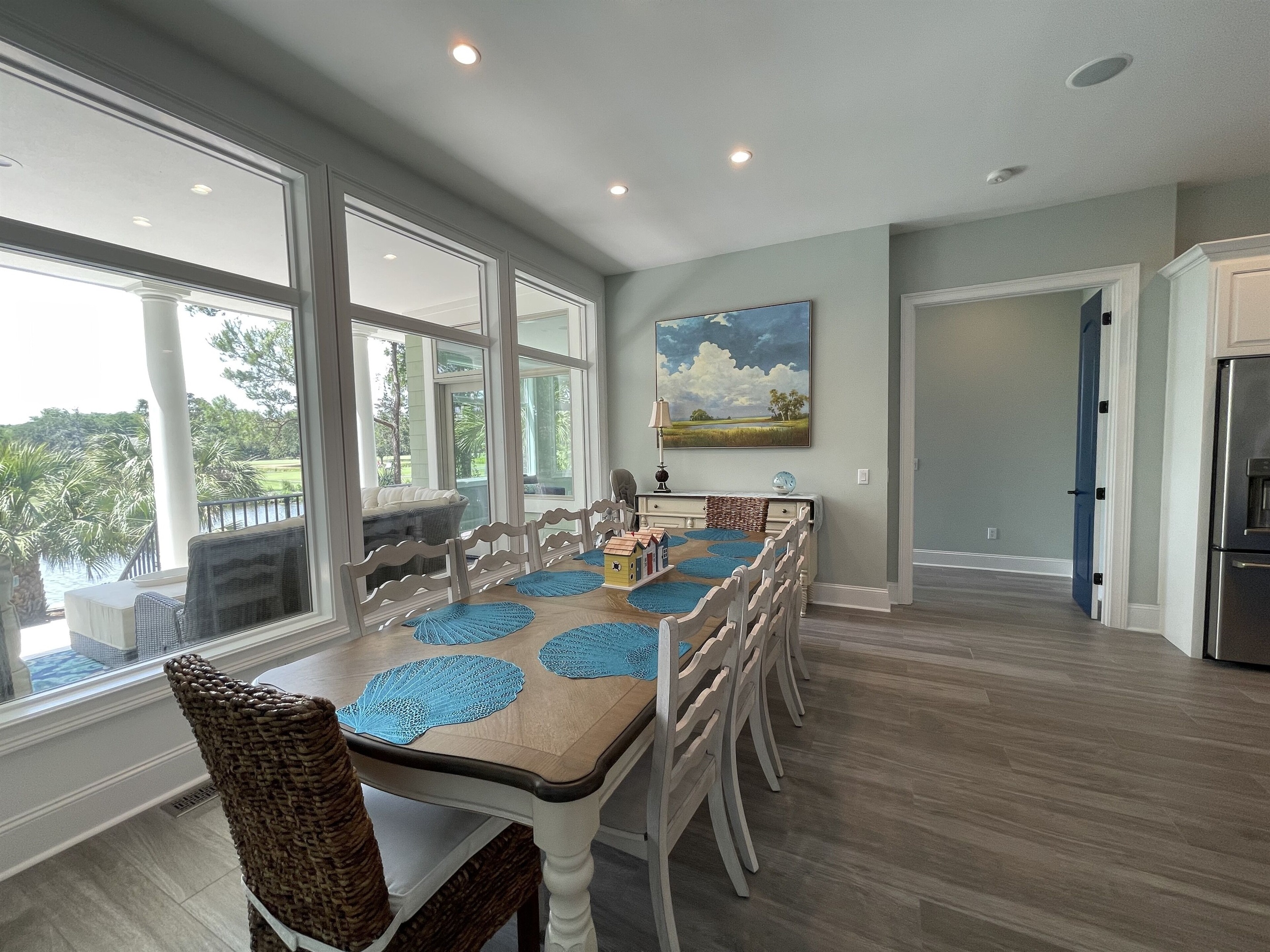 Dining area with seating for 10 has views of the 11 mile lagoon and golf course