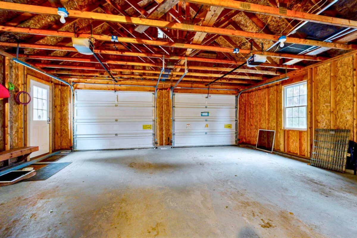 Big garage for 2 cars to park in and store all your gear! 