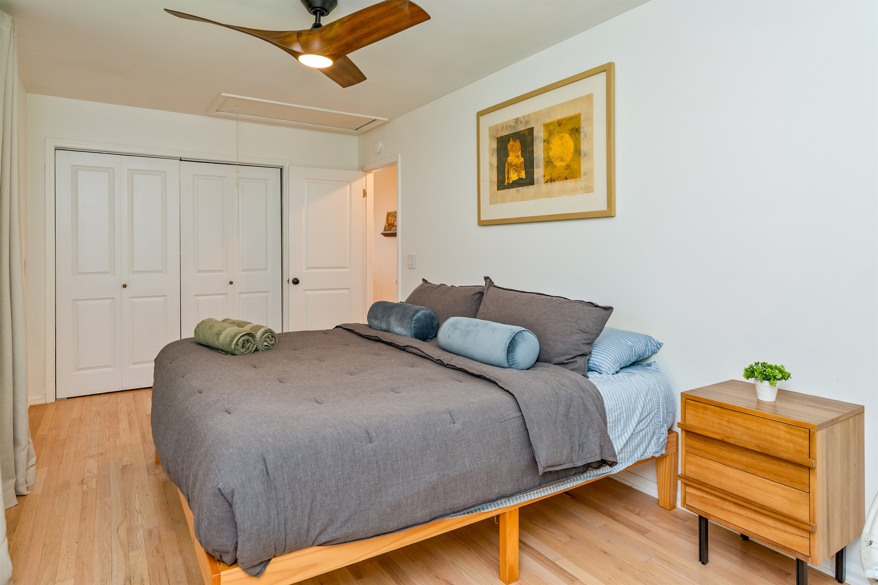 Relax in this serene king bedroom and plush bedding—your perfect escape after a day of Finger Lakes adventure