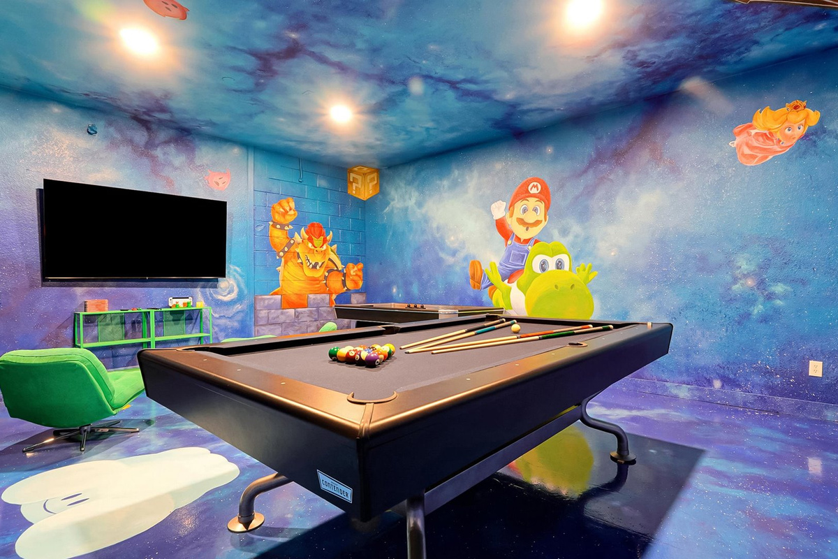 Mario Galaxy Games Room: Challenge the family to pool or air hockey surrounded by colourful, hand-painted Mario characters.