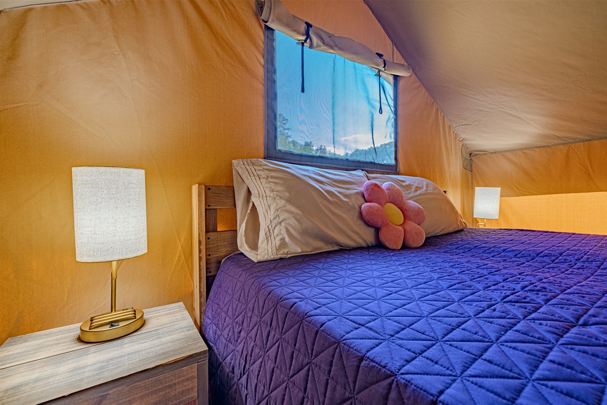 Sleep under canvas, but dream on a cloud. After a day of exploring, sink into your plush queen-sized bed, complete with soft linens and unique, vibrant decor.