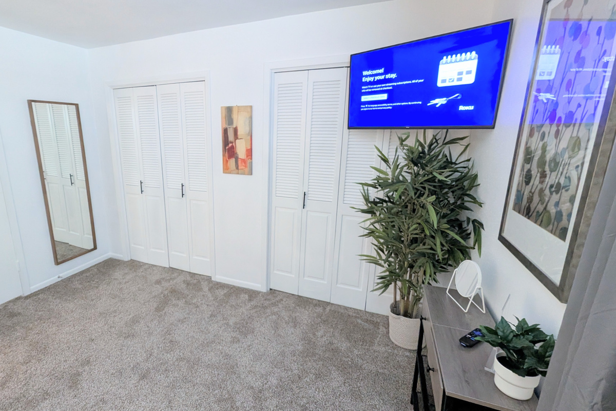 Relax while enjoying the Roku TV, checking your look in the full-length mirror, or using the two walk-in closets for ample storage.