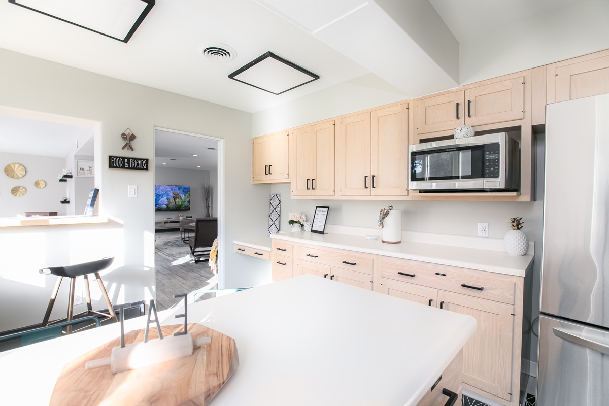 Spacious kitchen with new stainless steel appliances