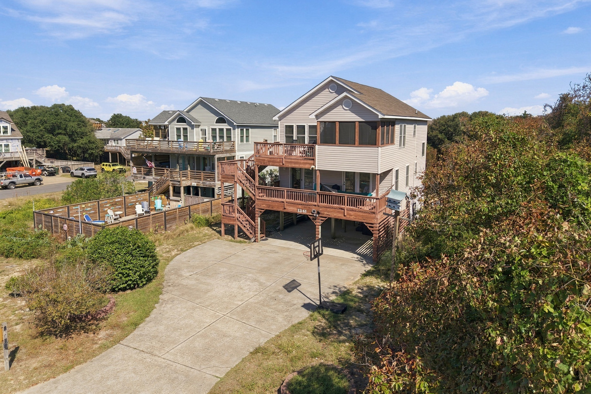 A bird's-eye look at the house, driveway and decks.