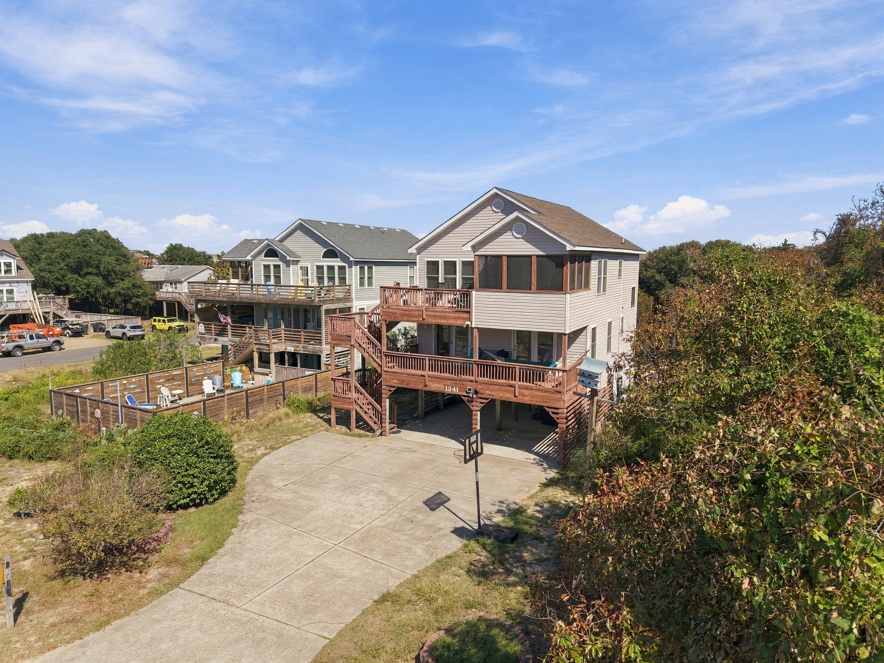 A bird's-eye look at the house, driveway and decks.