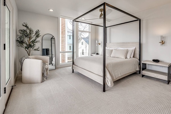 Main bedroom with queen memory foam bed and floor to ceiling windows 