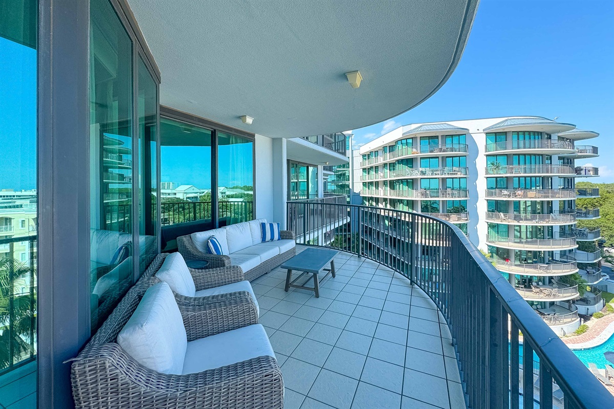 Enjoy your morning coffee or evening cocktails with the mesmerizing waterfront views. This balcony is the perfect place to unwind.