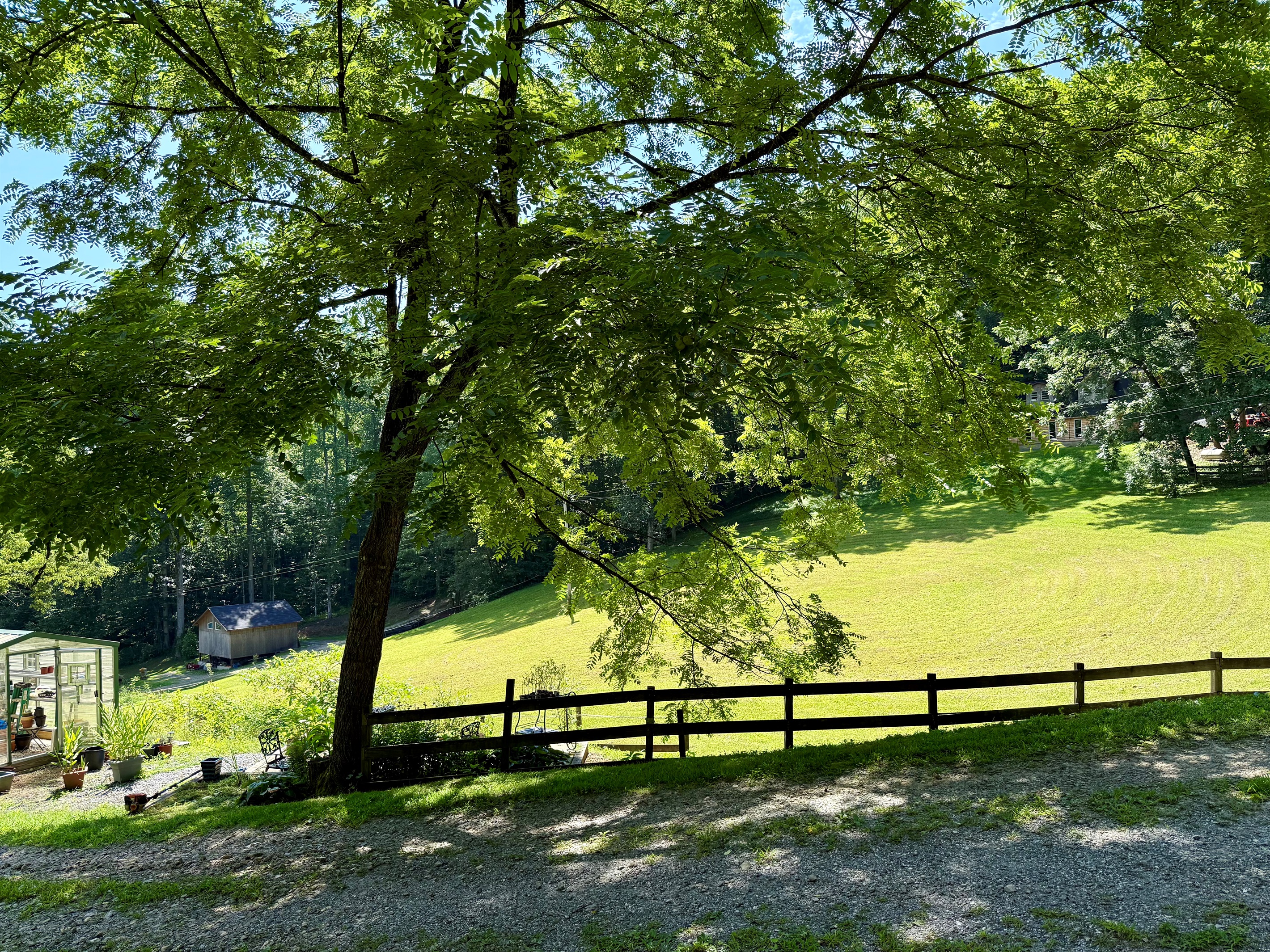 Wide-open pasture and valley views for peaceful mountain mornings.