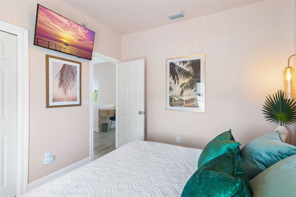 Bedroom 1 (Level 3): King bed, Smart TV, Chair + Desk, Balcony Access, Hallway Bathroom with Shower Tub Combo shared with Bedroom 2 (Sleeps 2)