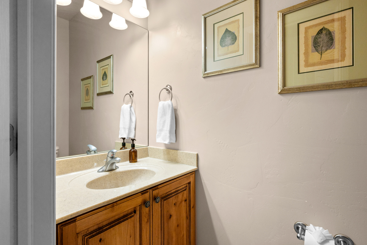 Convenient powder room adds extra comfort for families and groups.