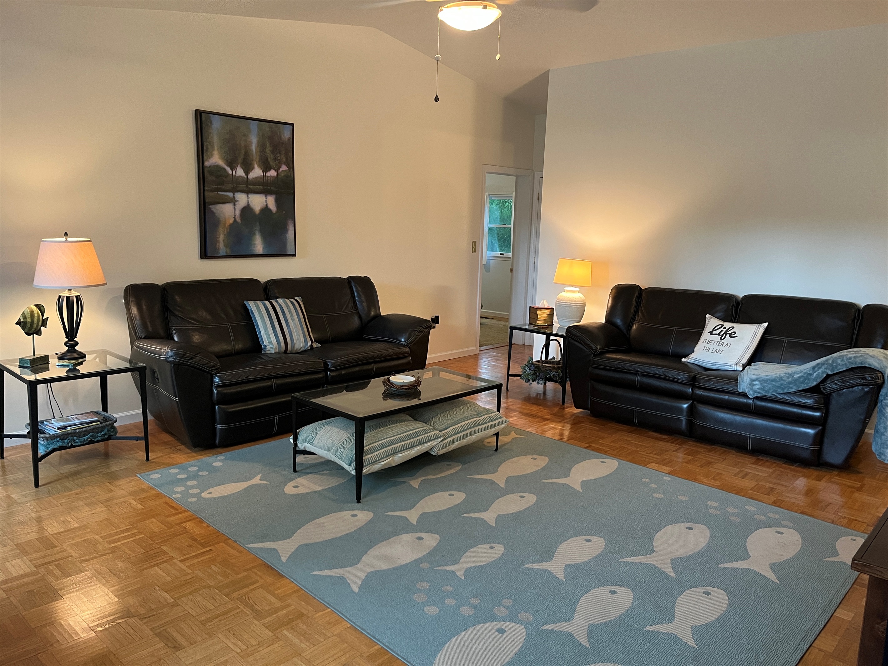 Large living room, connected to dining room and kitchen.